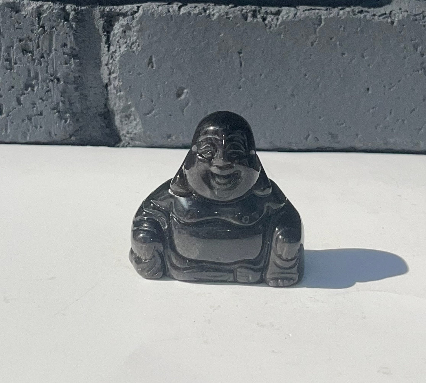 Silver Obsidian Buddha Carvings